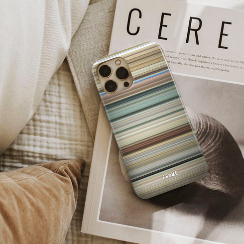 like stars on earth Frome phone case next to interior items