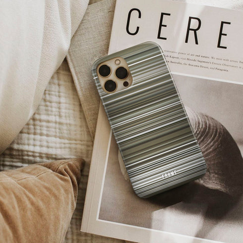adele - rolling in the deep Frome phone case next to interior items
