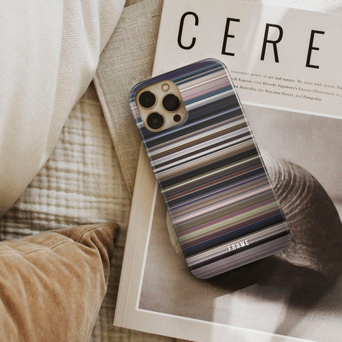 monster (2003) Frome phone case next to interior items