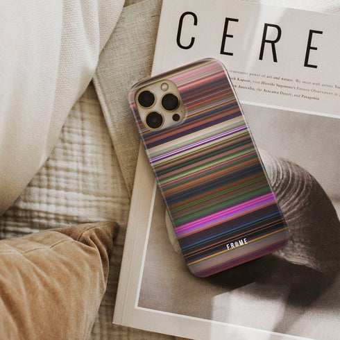 encanto Frome phone case next to interior items