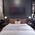 Bedroom interior with Becky-G-Bad-Bunny-Mayores Frome on the wall