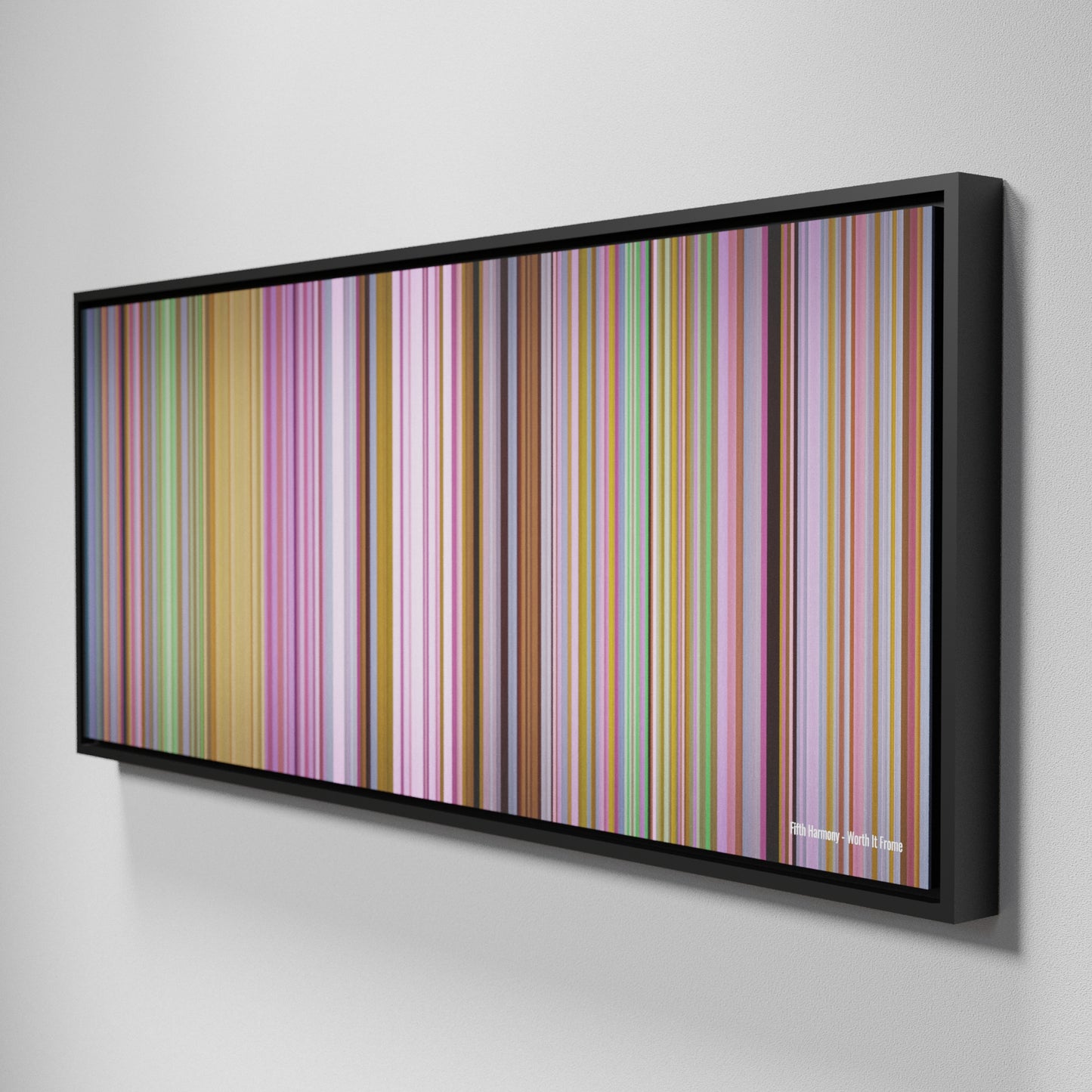 Side view of Framed Buff's of Fifth-Harmony-Worth-It Frome on the wall