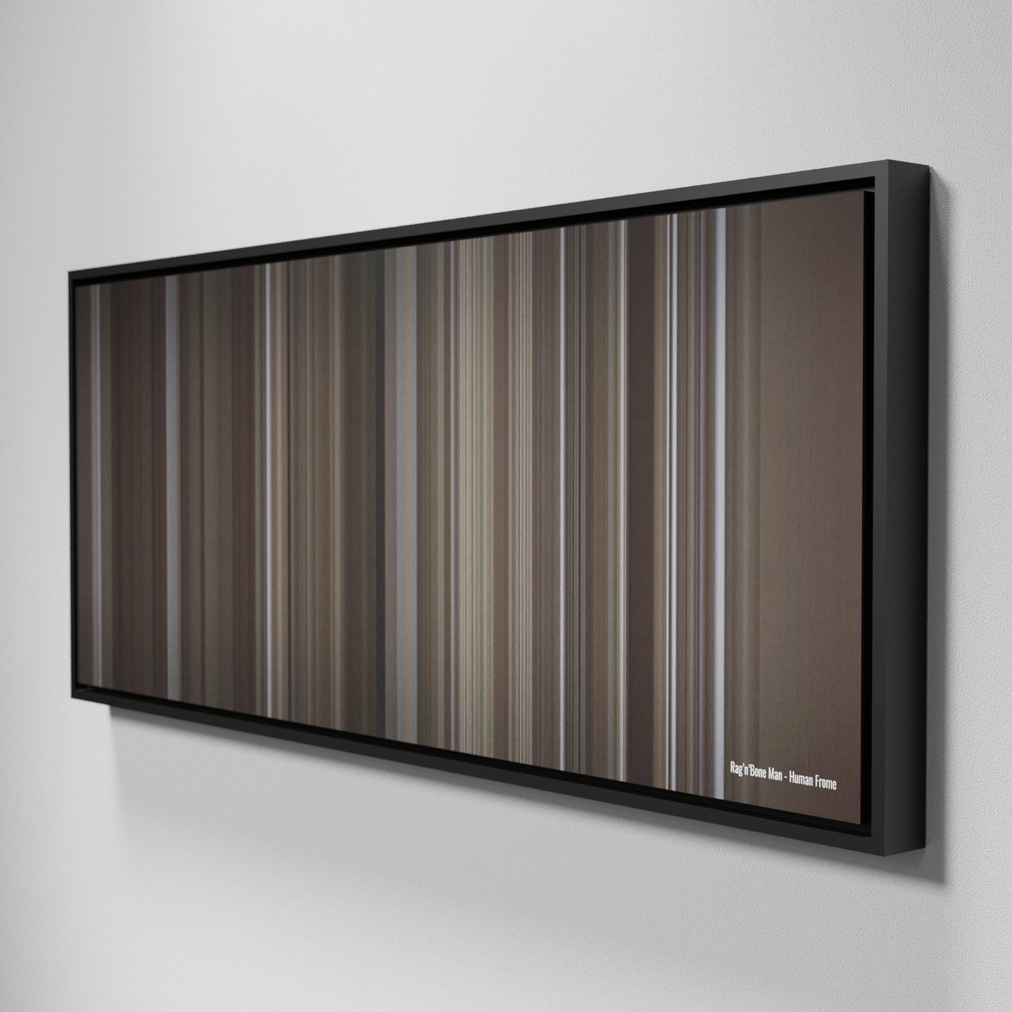 Side view of Framed Buff's of RagnBone-Man-Human Frome on the wall