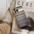 wisin - escapate conmigo Frome phone case next to interior items
