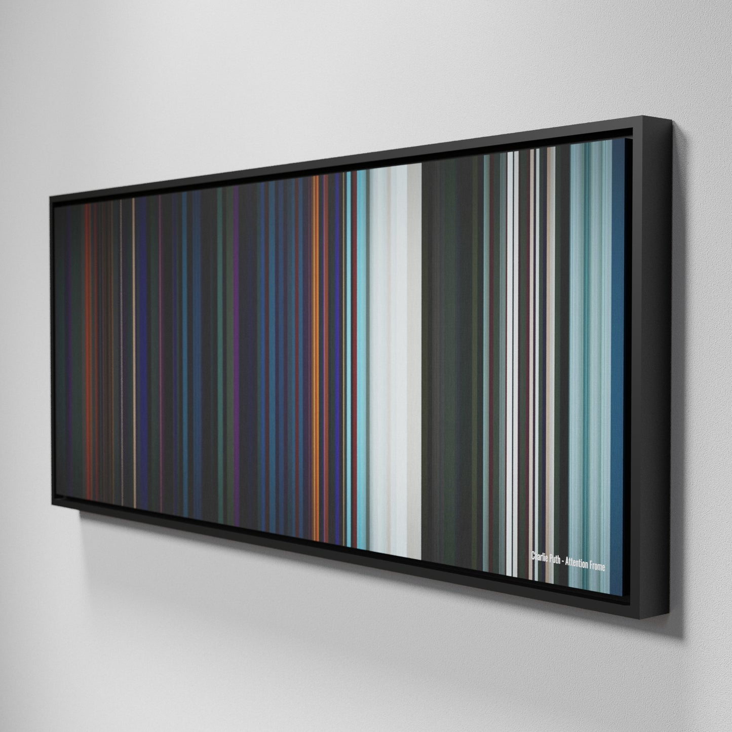 Side view of Framed Buff's of Charlie-Puth-Attention Frome on the wall