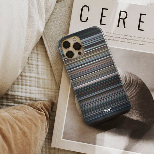 reik - me niego Frome phone case next to interior items