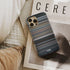reik - me niego Frome phone case next to interior items
