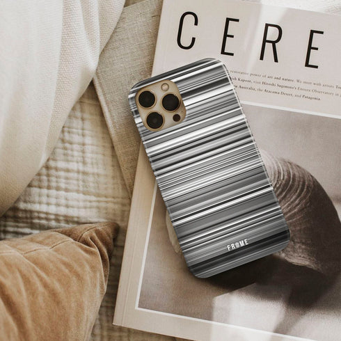 karol g, anuel aa - culpables Frome phone case next to interior items