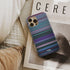 karol g, bad bunny - ahora me llama Frome phone case next to interior items