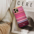 rihanna - only girl Frome phone case next to interior items
