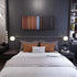 Bedroom interior with Rihanna-Man-Down Frome on the wall