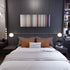 Bedroom interior with Calvin-Harris-I-Need-Your-Love Frome on the wall
