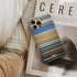 kygo - firestone Frome phone case next to interior items