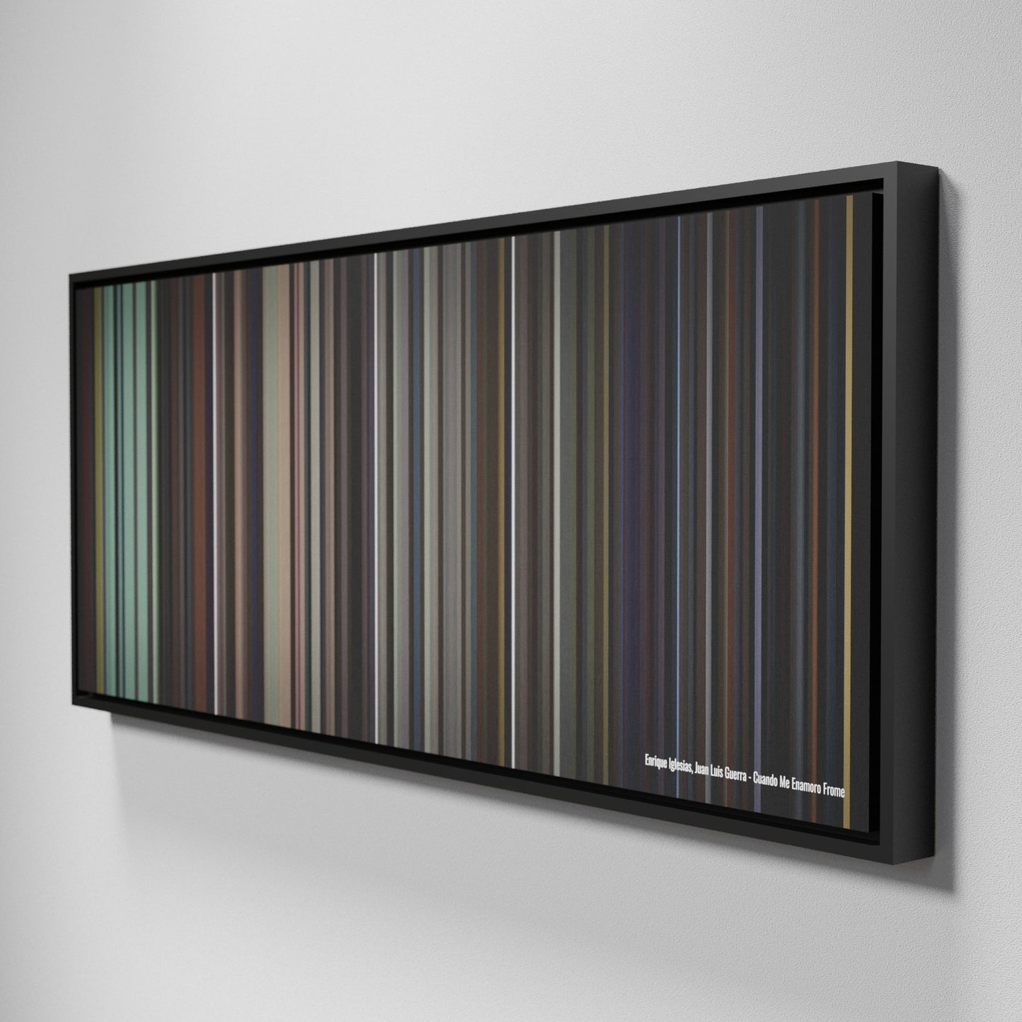 Side view of Framed Buff's of Enrique-Iglesias-Juan-Luis-Guerra-Cuando-Me-Enamoro Frome on the wall