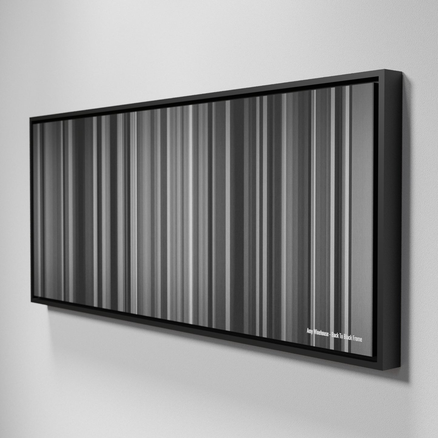 Side view of Framed Buff's of Amy-Winehouse-Back-To-Black Frome on the wall