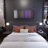 Bedroom interior with Romeo-Santos-Daddy-Yankee-Nicky-Jam-Bella-y-Sensual Frome on the wall