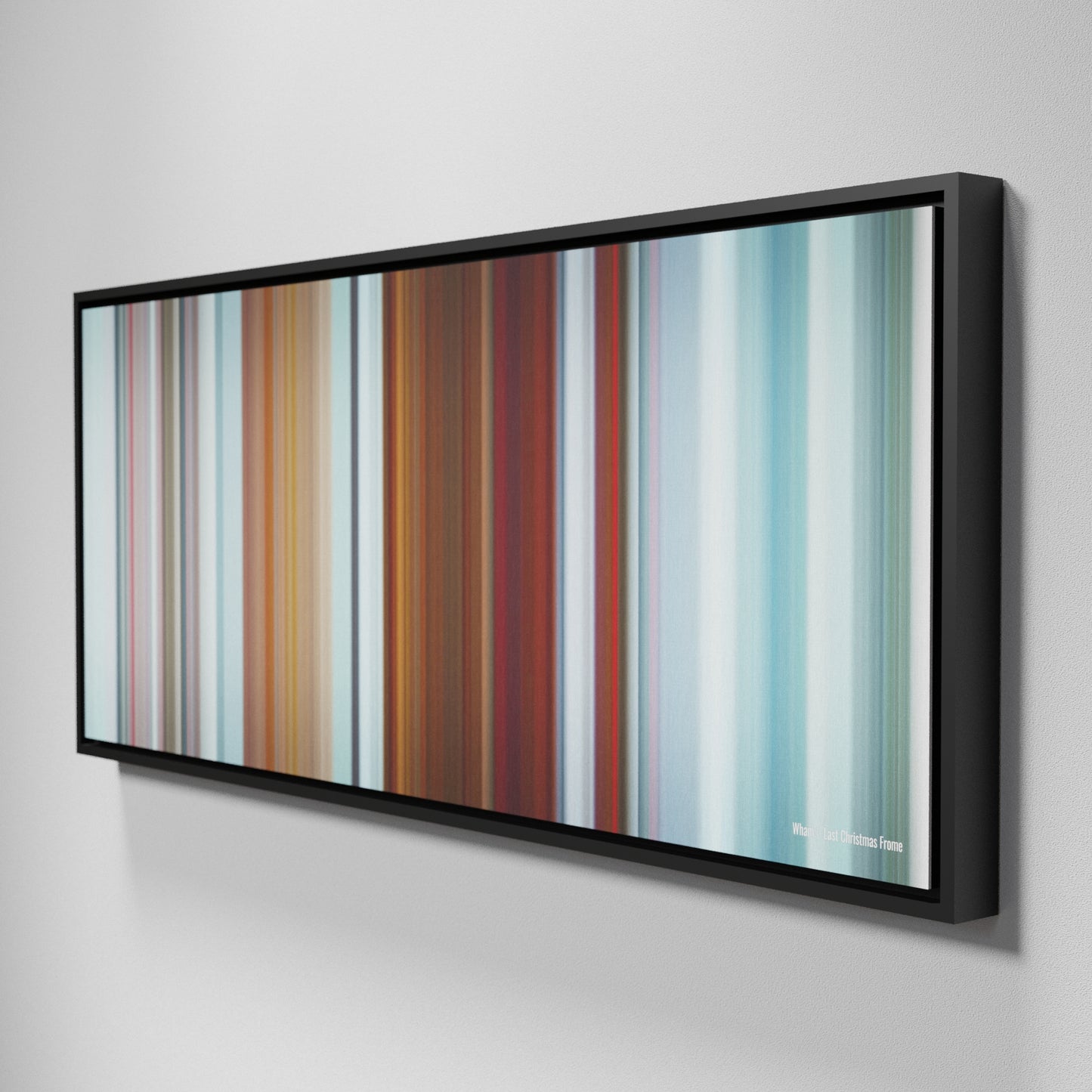 Side view of Framed Buff's of Wham-Last-Christmas Frome on the wall