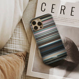 aftersun Frome phone case next to interior items
