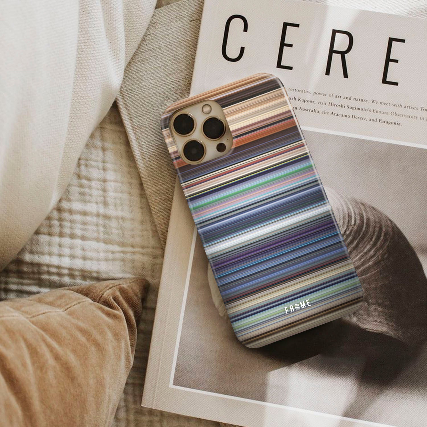 wall-e Frome phone case next to interior items