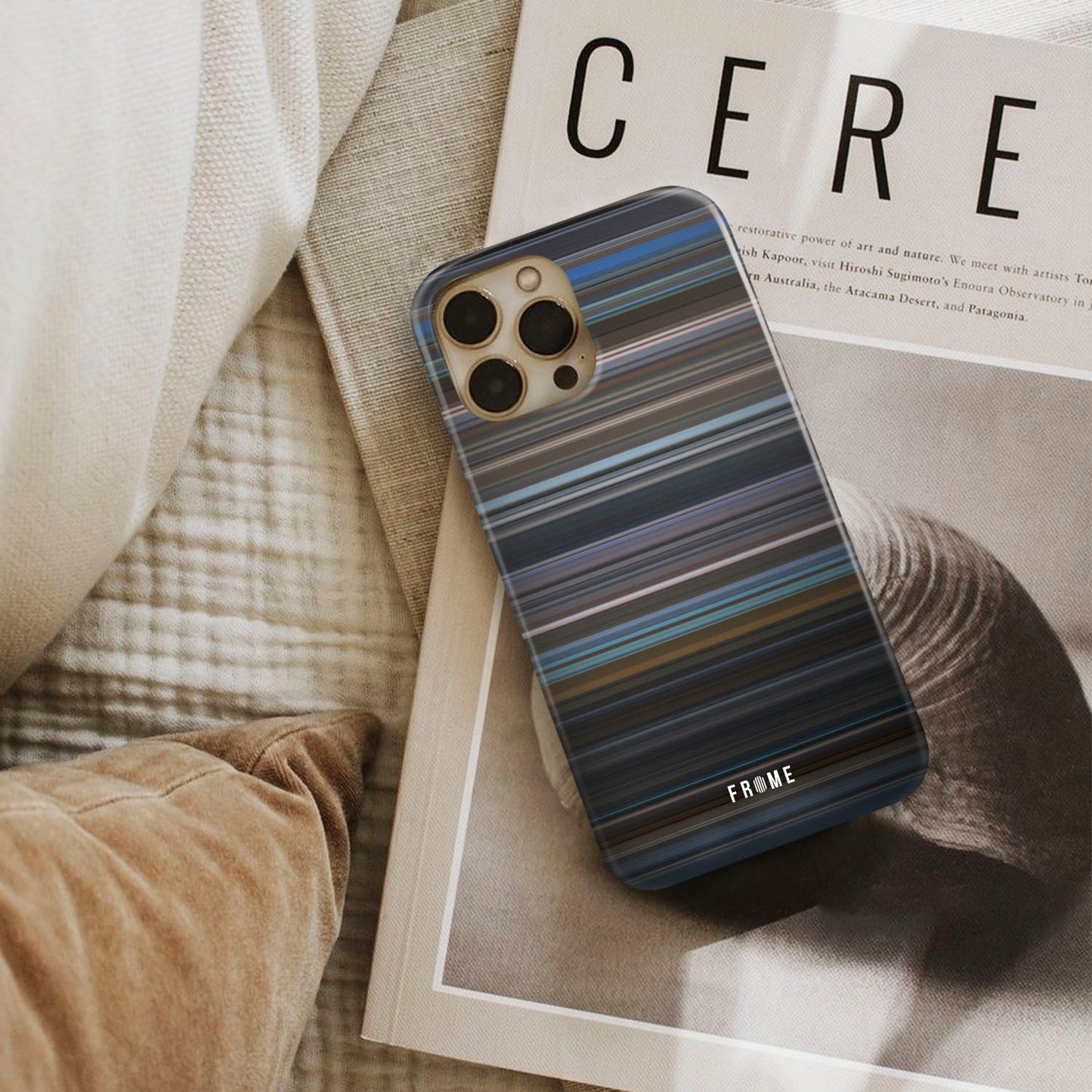 unbreakable Frome phone case next to interior items