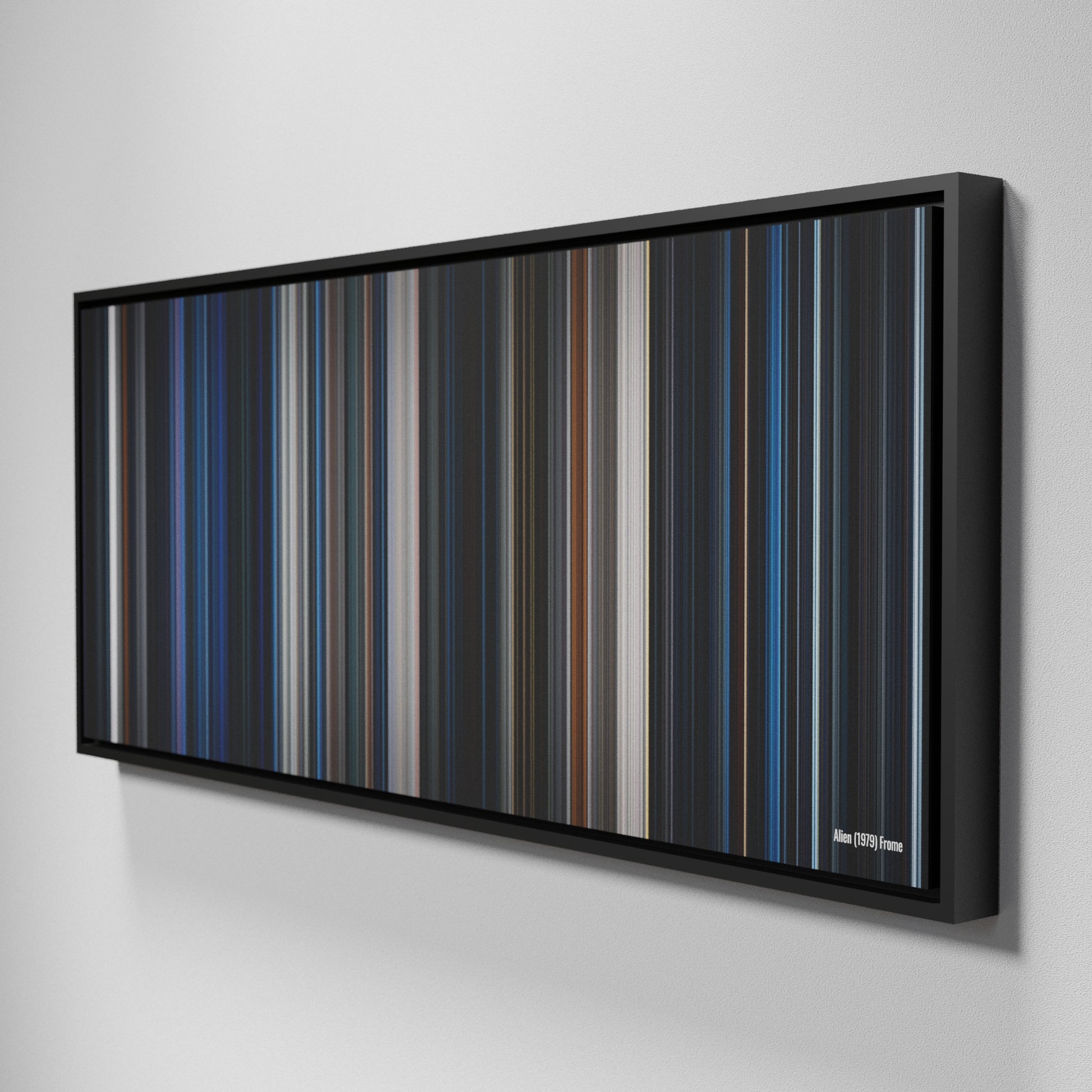 Side view of Framed Buff's of Alien Frome on the wall