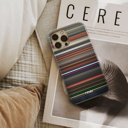 coraline Frome phone case next to interior items