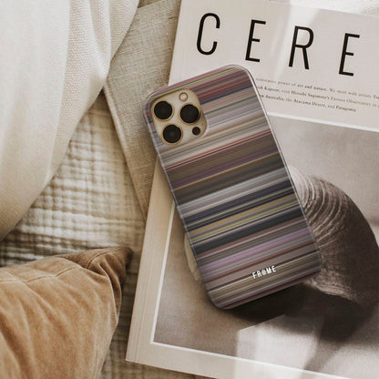 13 going on 30 Frome phone case next to interior items