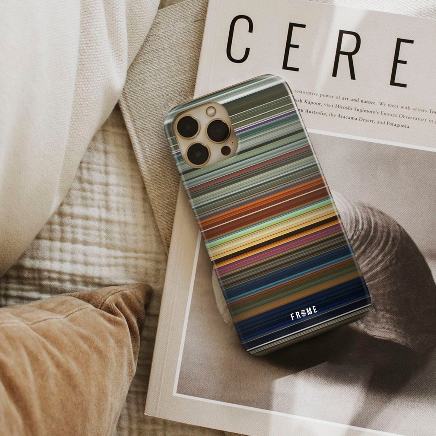 ad astra Frome phone case next to interior items