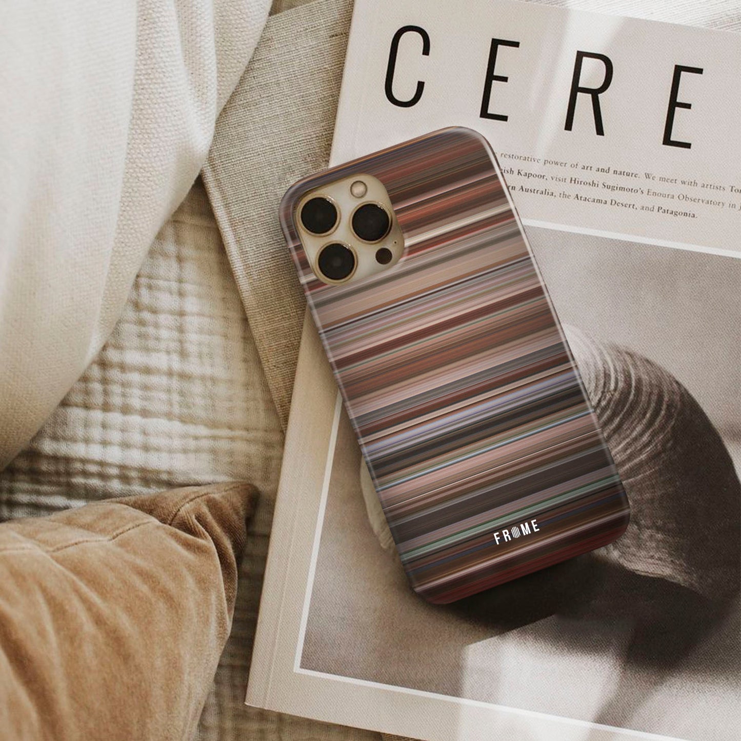 uptown girls Frome phone case next to interior items