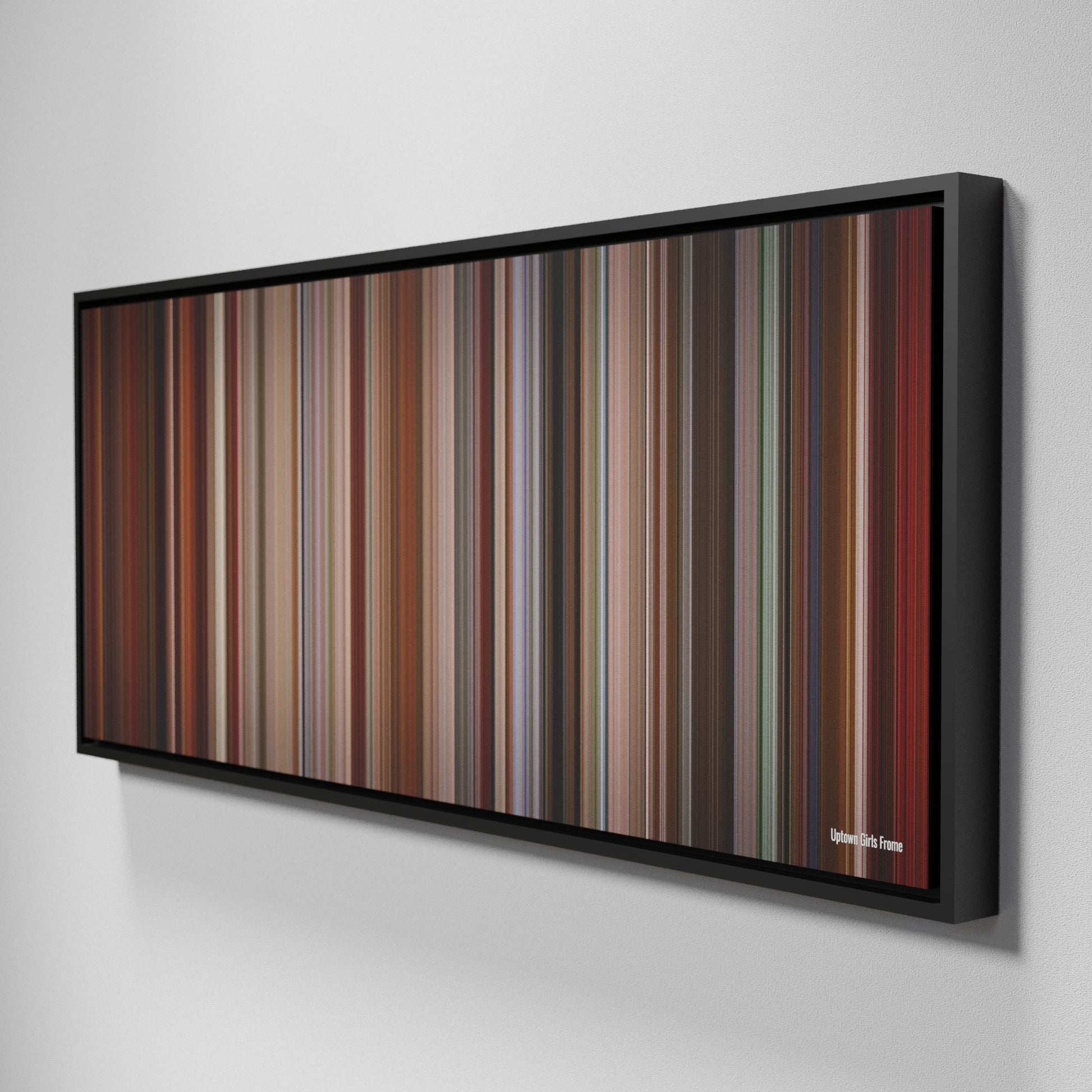 Side view of Framed Buff's of Uptown Girls Frome on the wall