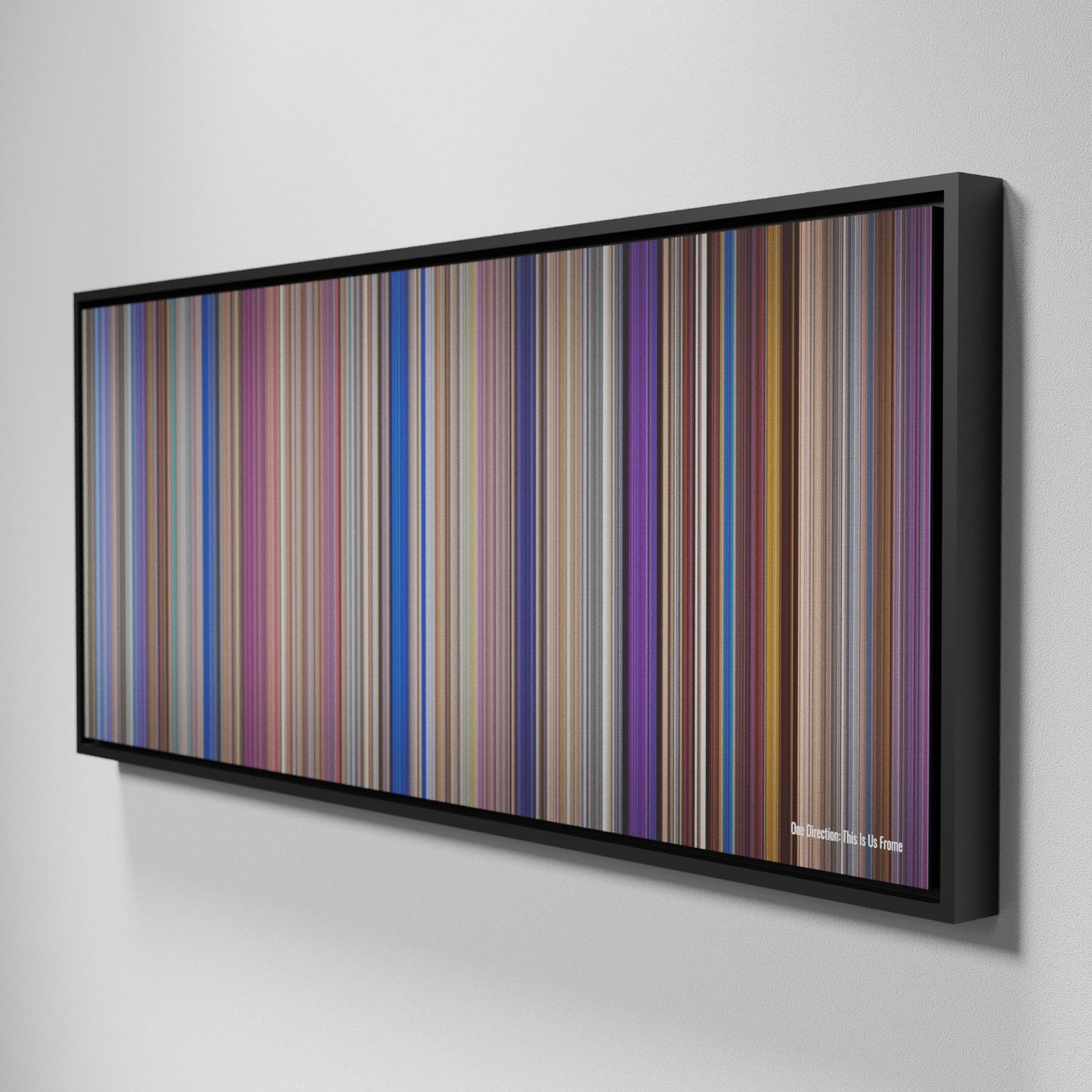 Side view of Framed Buff's of One Direction: This Is Us Frome on the wall