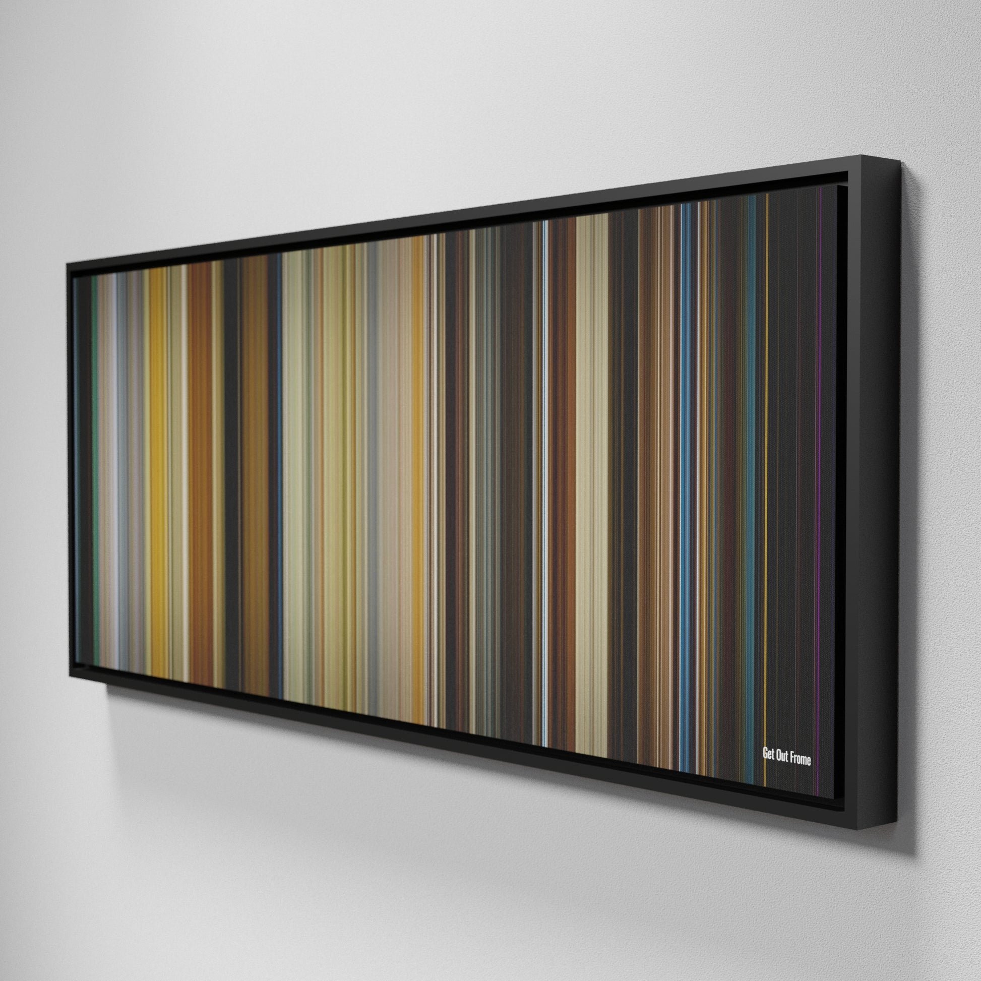 Side view of Framed Buff's of Get Out Frome on the wall