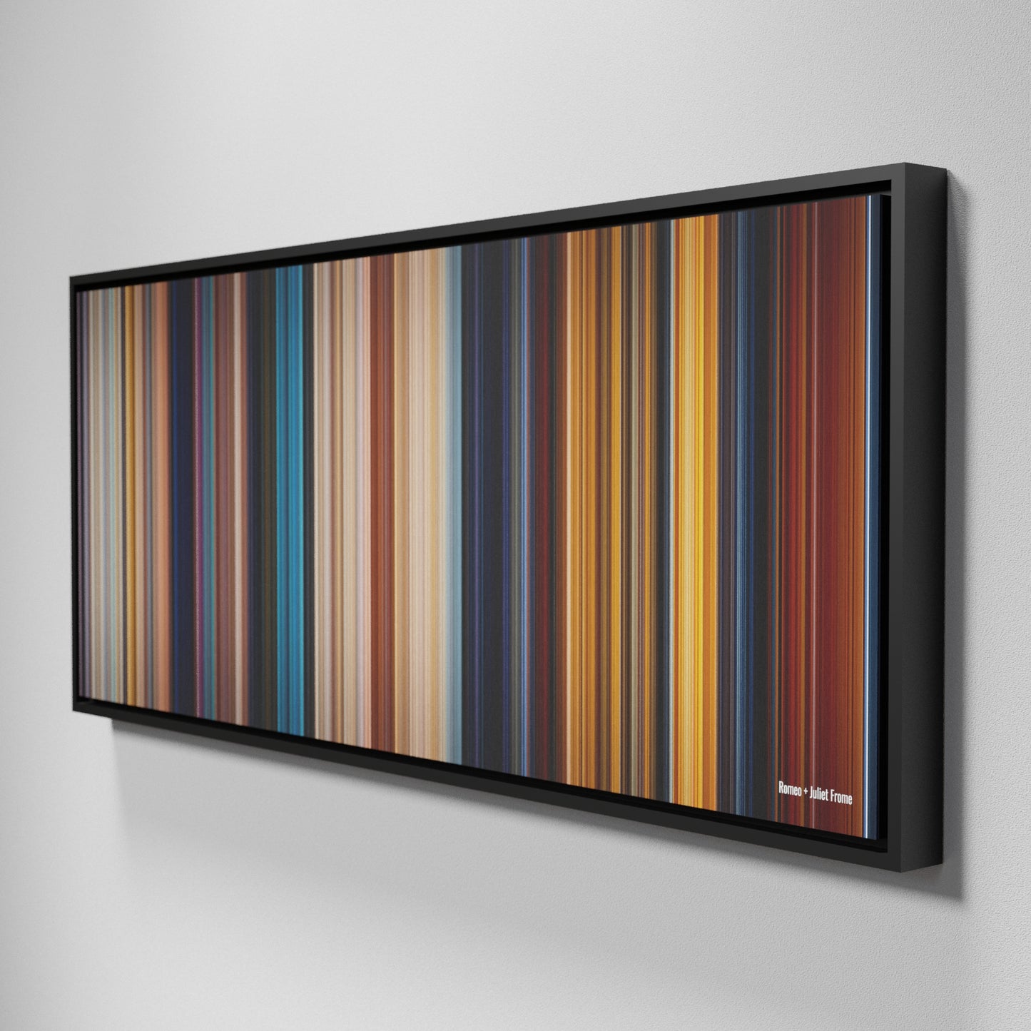 Side view of Framed Buff's of Romeo + Juliet Frome on the wall