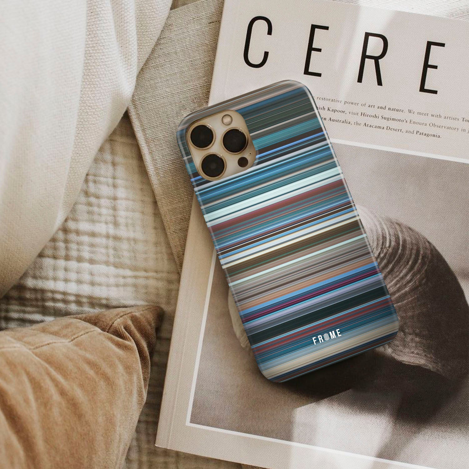 aquaman Frome phone case next to interior items