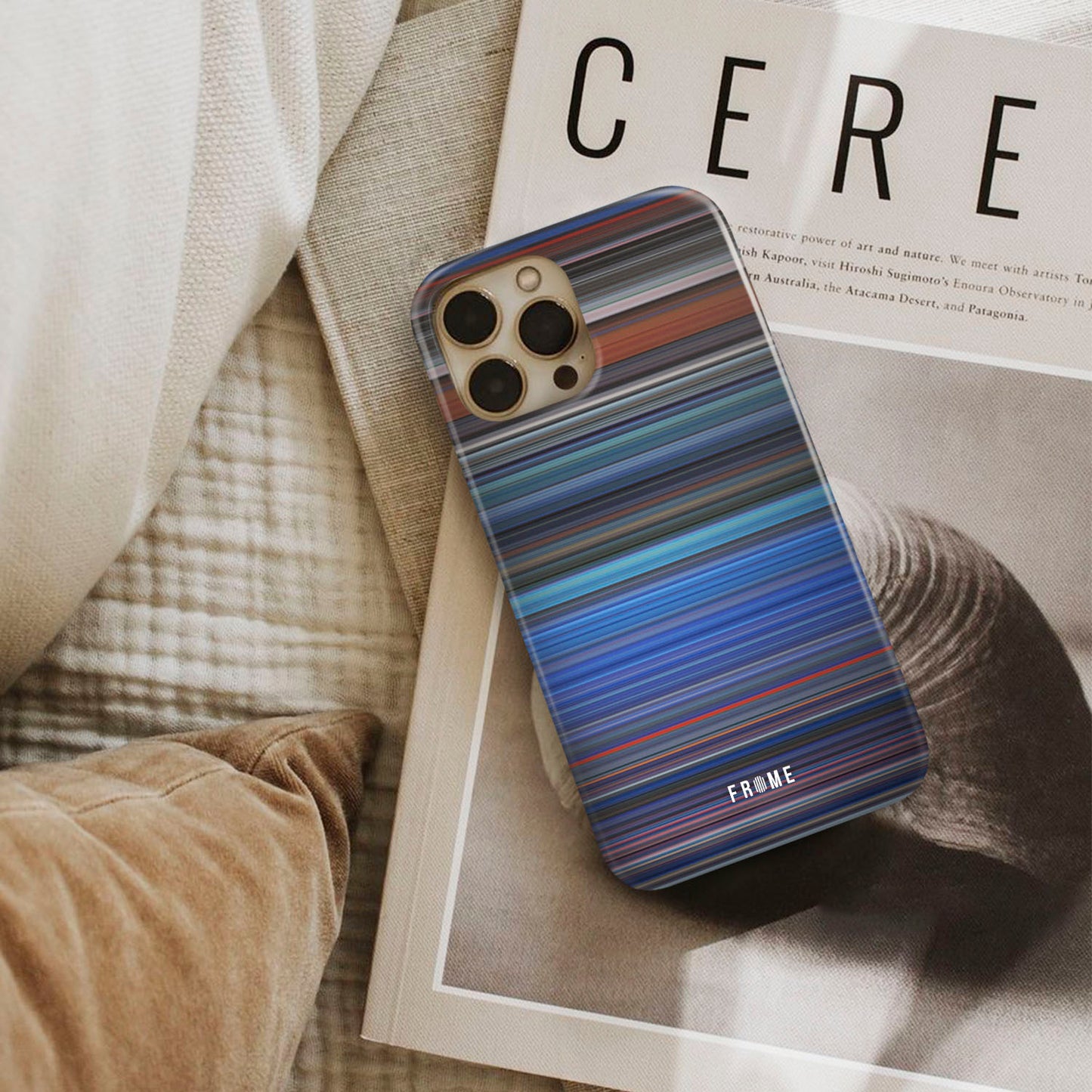 tron Frome phone case next to interior items