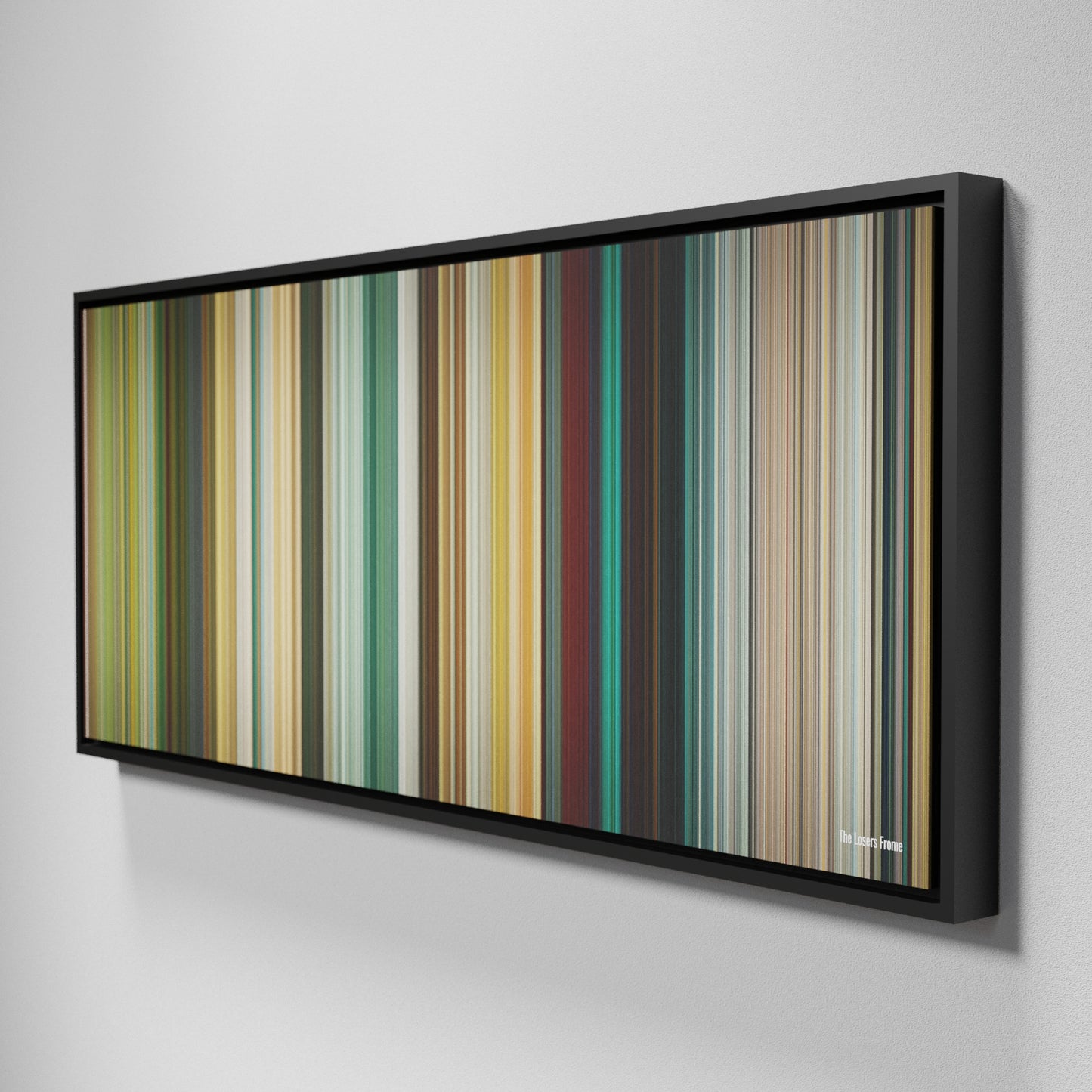 Side view of Framed Buff's of The Losers Frome on the wall