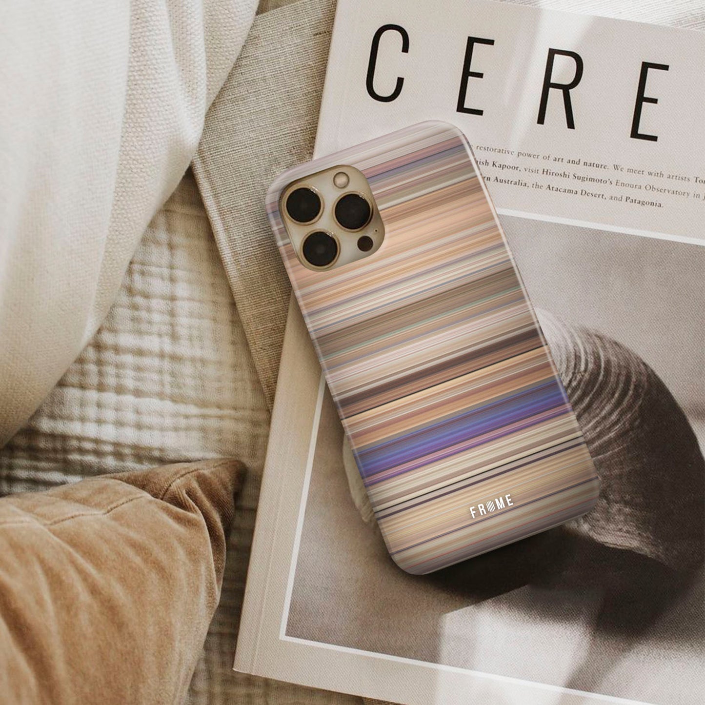 white chicks Frome phone case next to interior items