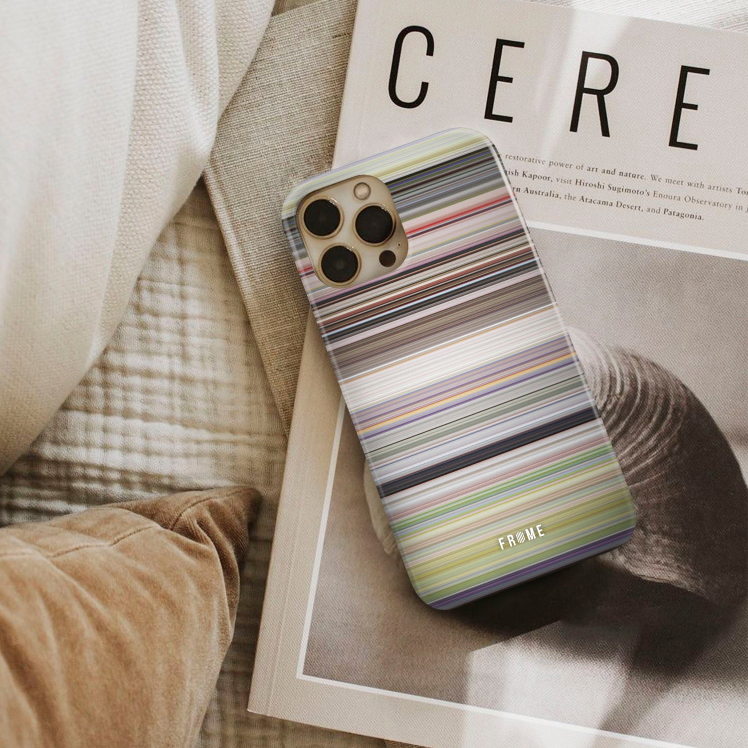 yellow submarine Frome phone case next to interior items