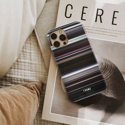 under the skin Frome phone case next to interior items