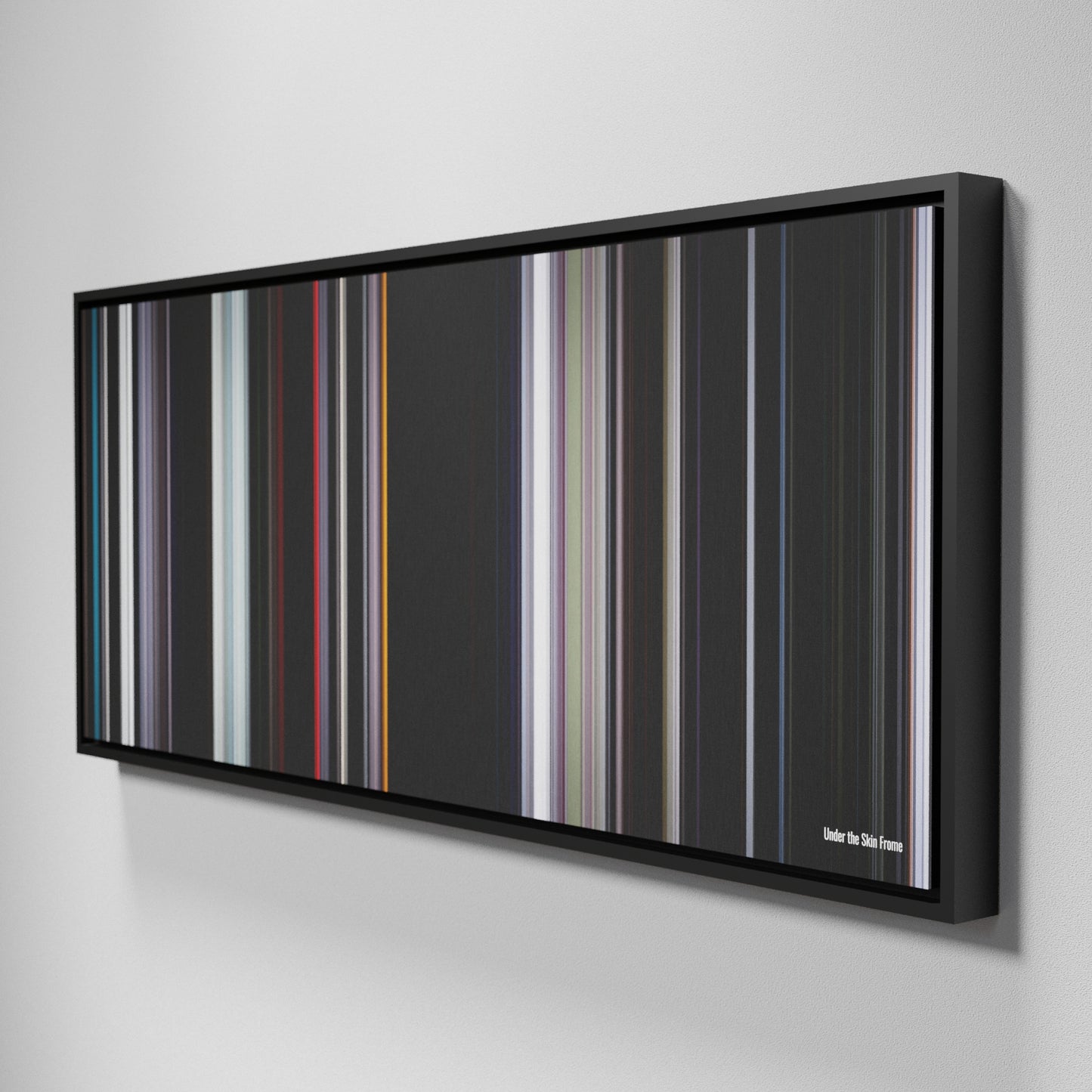 Side view of Framed Buff's of Under the Skin Frome on the wall