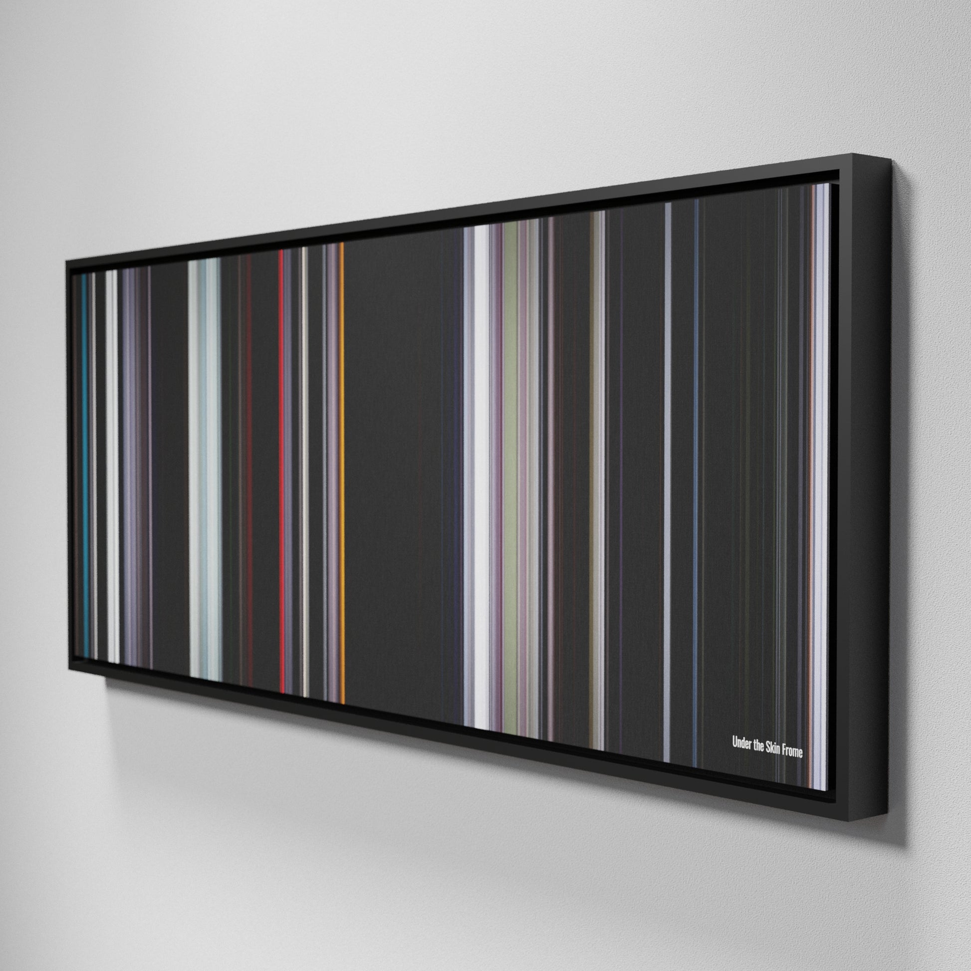 Side view of Framed Buff's of Under the Skin Frome on the wall