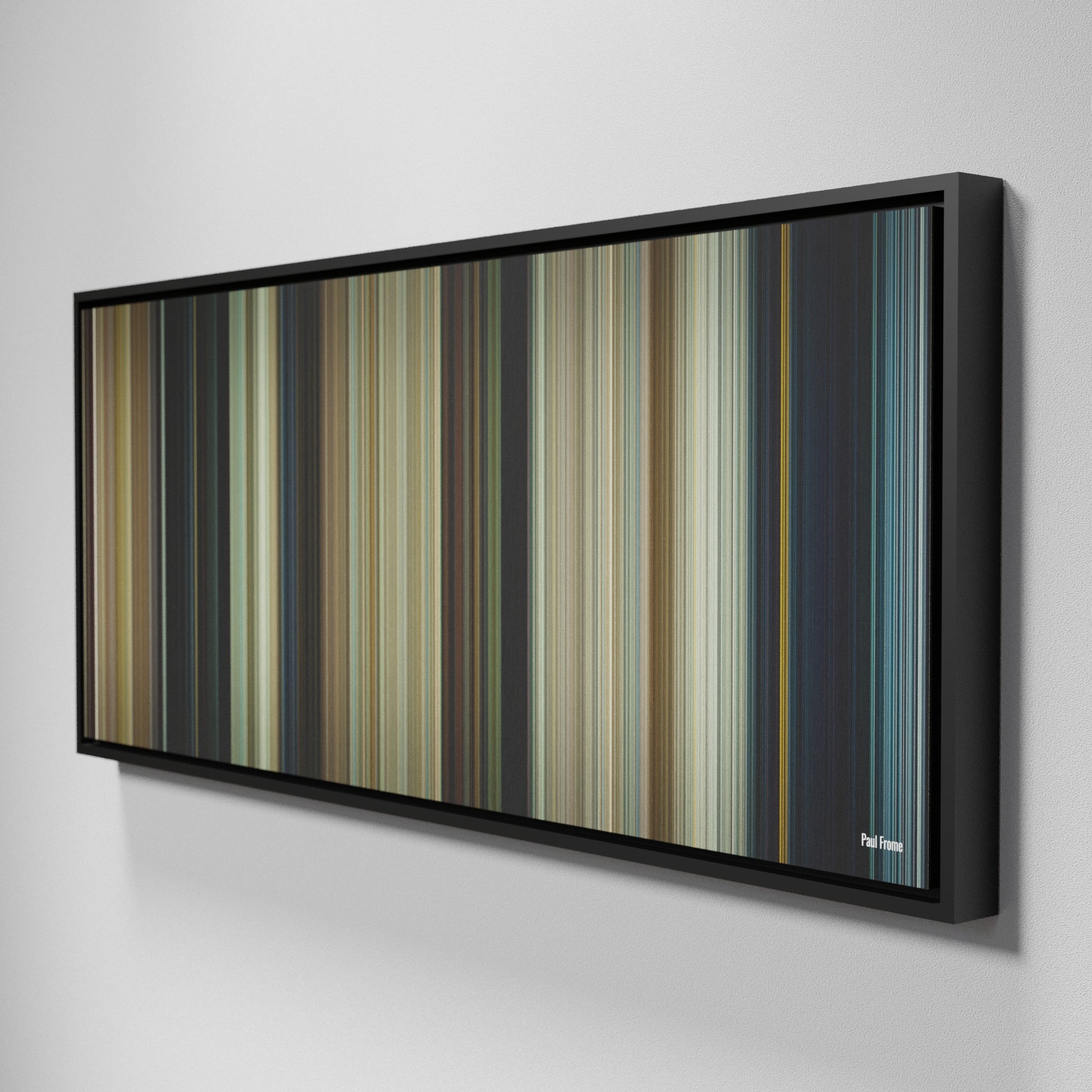 Side view of Framed Buff's of Paul Frome on the wall