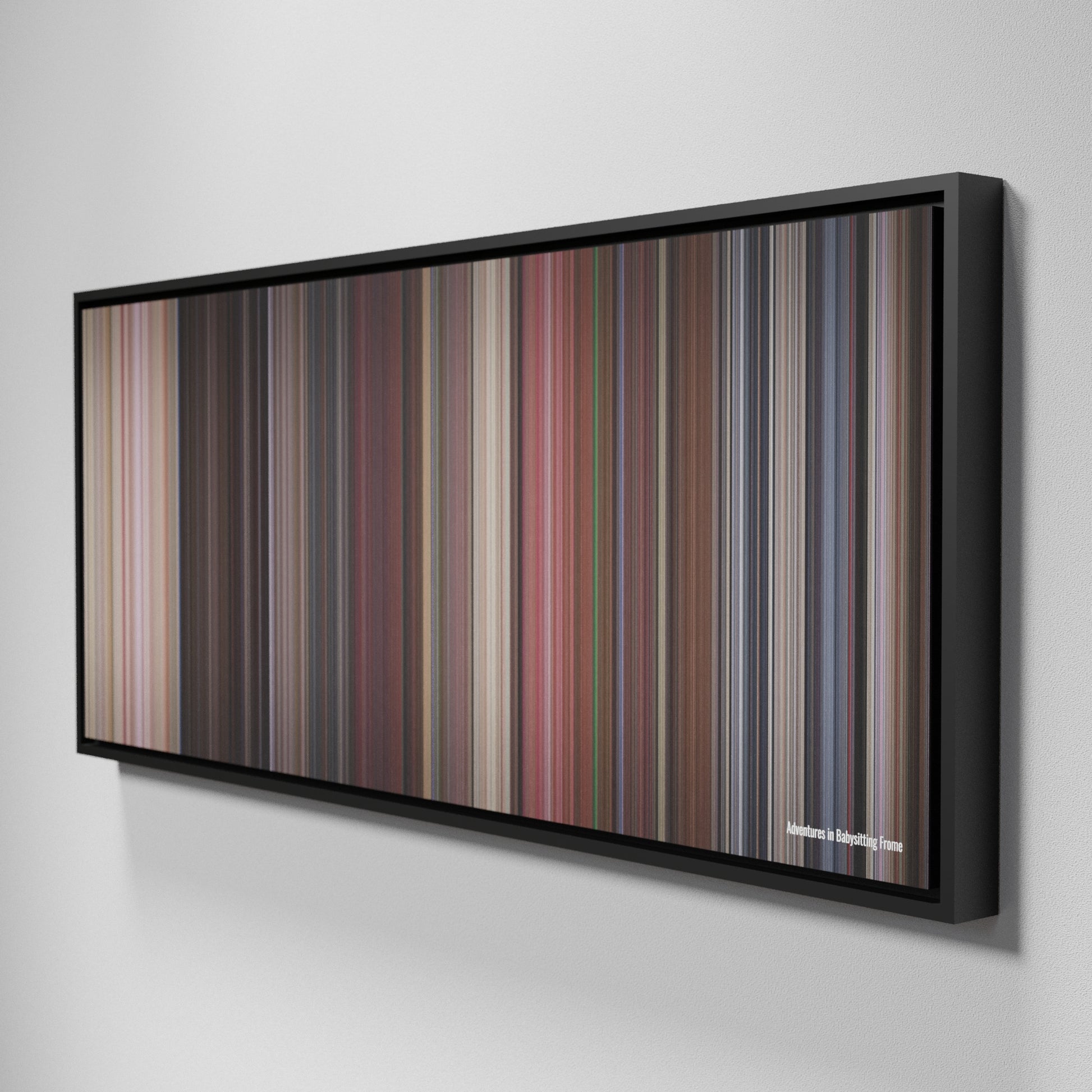 Side view of Framed Buff's of Adventures in Babysitting Frome on the wall