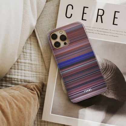 vanilla sky Frome phone case next to interior items