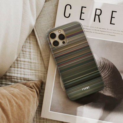 time lapse Frome phone case next to interior items