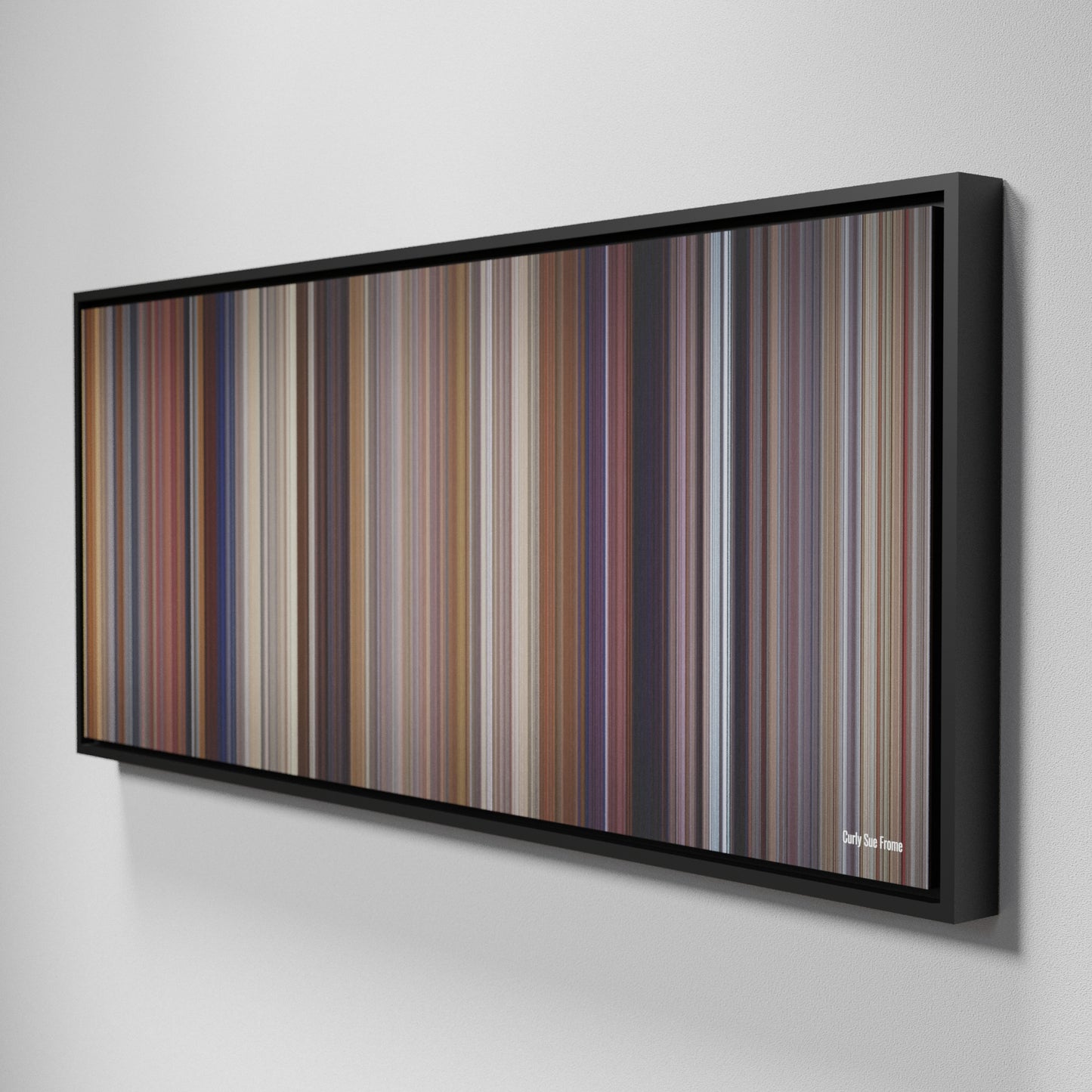 Side view of Framed Buff's of Curly Sue Frome on the wall