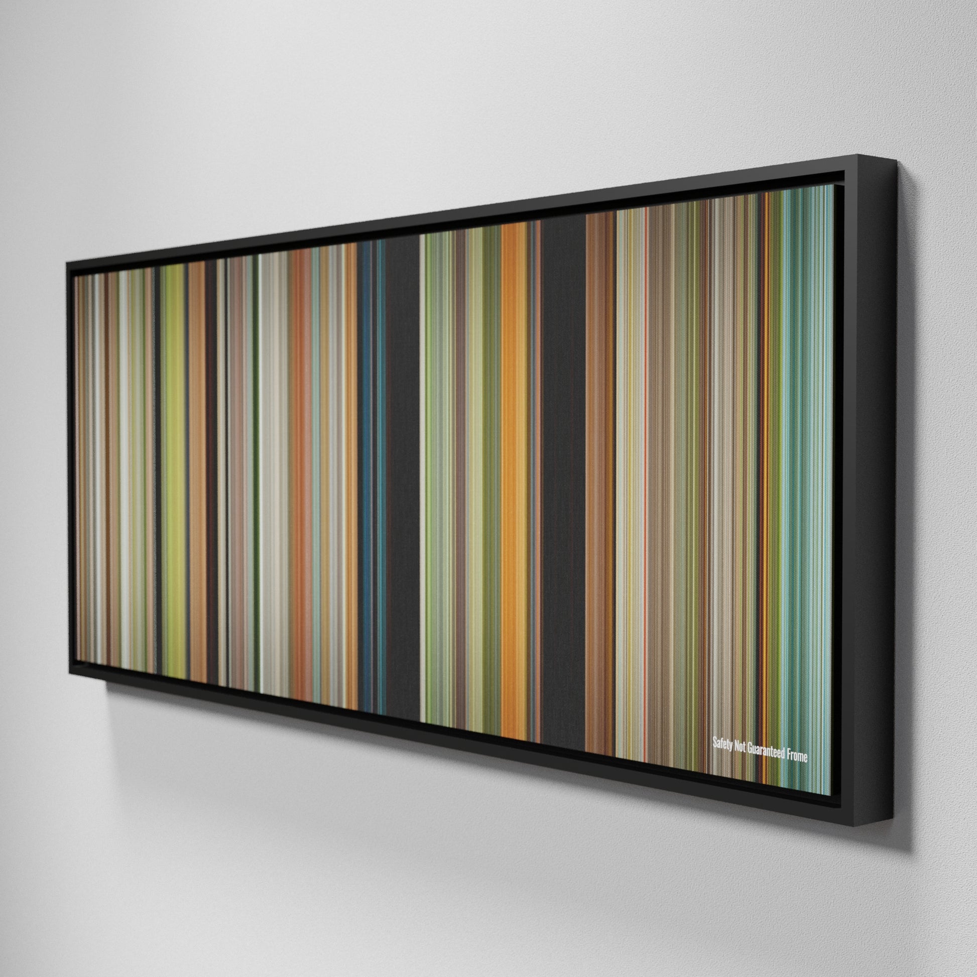 Side view of Framed Buff's of Safety Not Guaranteed Frome on the wall