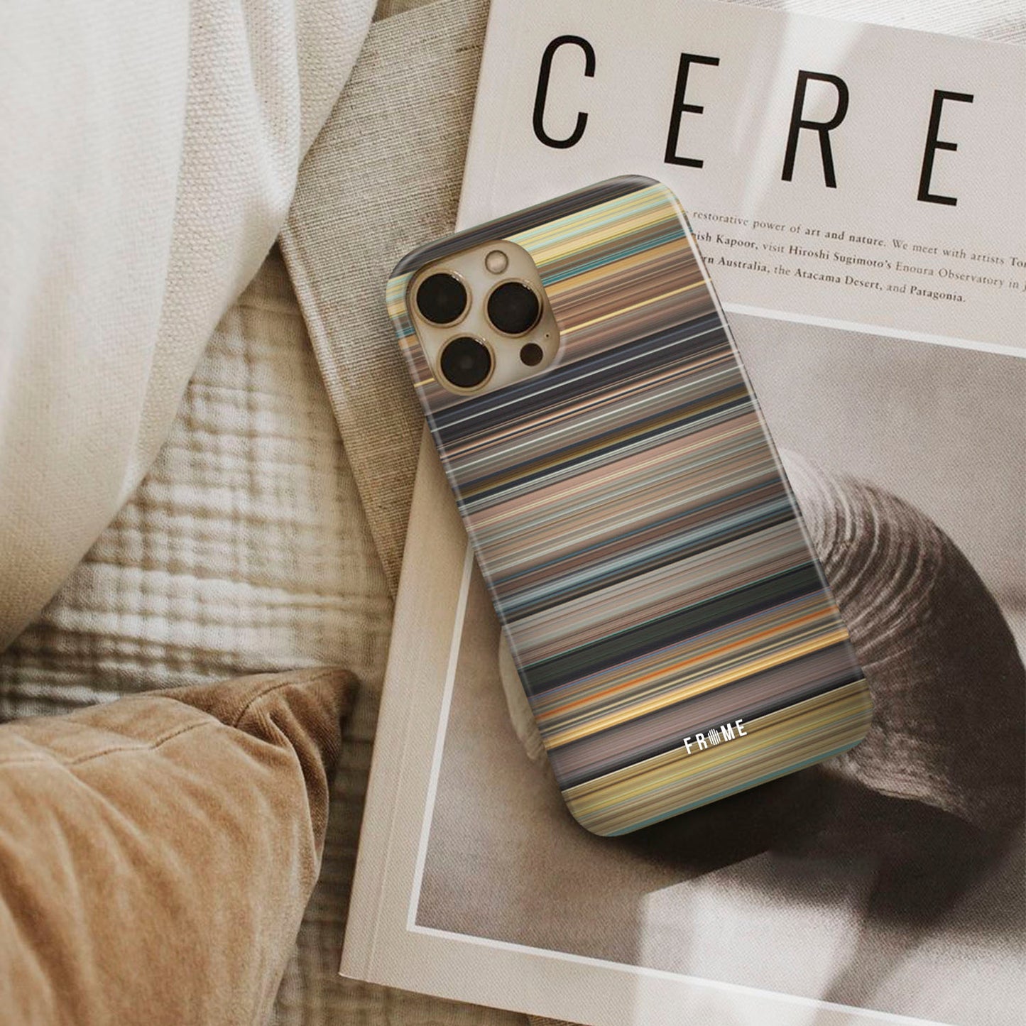 127 hours Frome phone case next to interior items