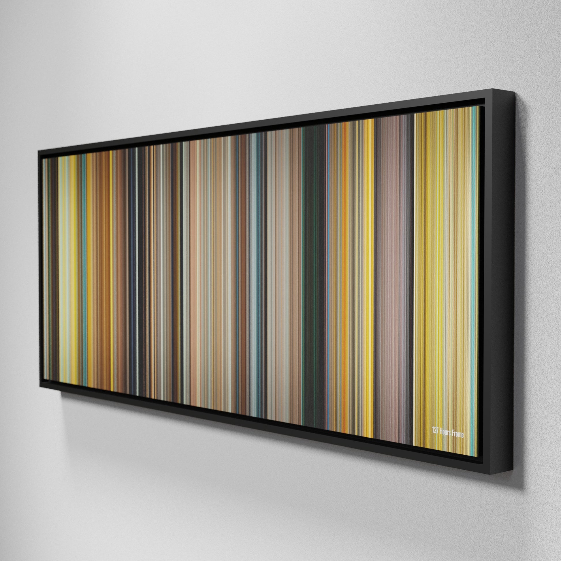 Side view of Framed Buff's of 127 Hours Frome on the wall