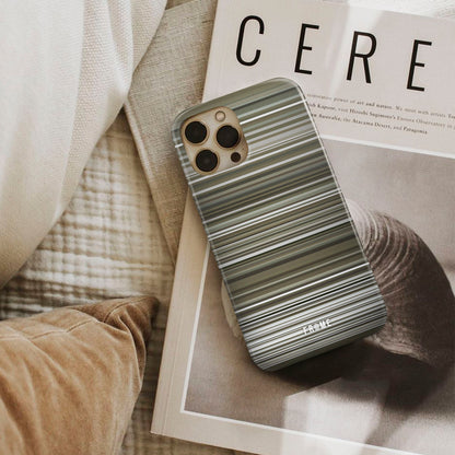 adele - rolling in the deep Frome phone case next to interior items